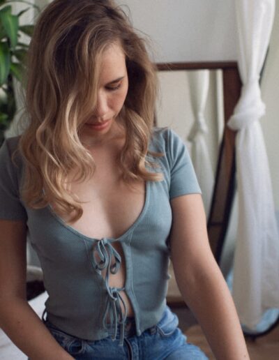 beautiful woman in a sheer blue top
